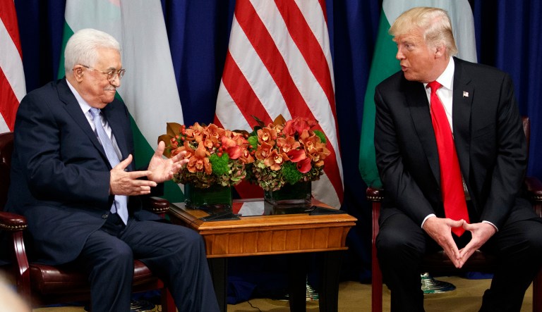 President Trump met with Palestinian President Mahmoud Abbas during the U.N. General Assembly in September. On Saturday, the Trump administration informed Palestinian officials that their Washington office will lose its diplomatic permit. The Palestinians believe the decision is retaliation for their September decision to ask the International Criminal Court to charge Israeli officials with war crimes offenses. (AP Photo/Evan Vucci)