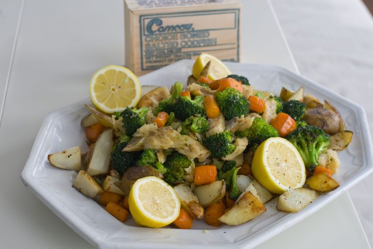   This undated image shows soaked salt cod that becomes a meaty and delicious dinner with roasted potatoes and vegetables. (AP Photo/Matthew Mead)  