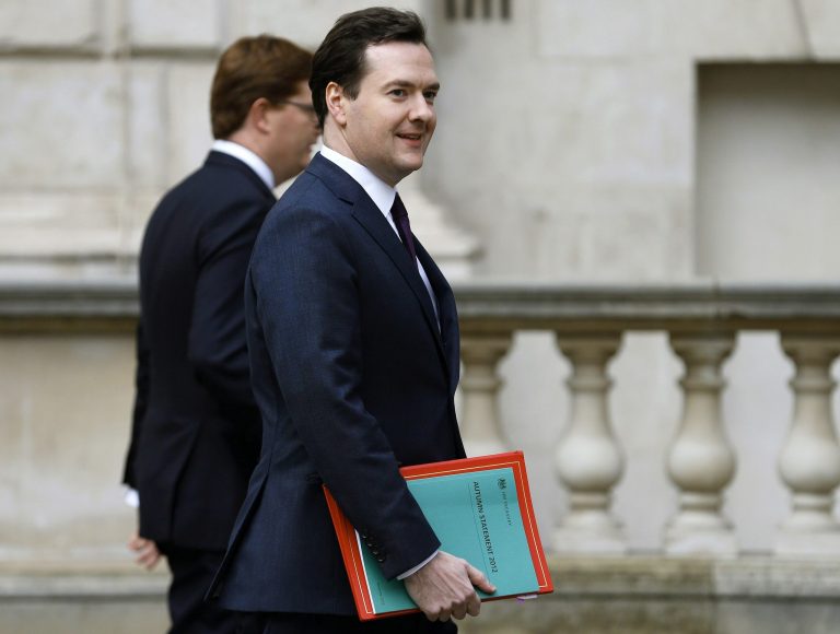   Britain's Chancellor of the Exchequer, George Osborne, right, walks with Chief Secretary to the Treasury, Danny Alexander, to deliver the half-yearly budget statement to parliament in London, Wednesday Dec. 5, 2012. Britain's Treasury chief, George Osborne, unveiled plans to kick-start the U.K.'s moribund economy when he presented his updated budget policies to lawmakers. (AP Photo/Andrew Winning, Pool)  