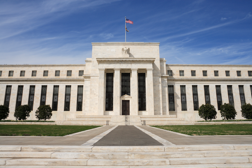 Fed on track to end bond purchases despite market volatility