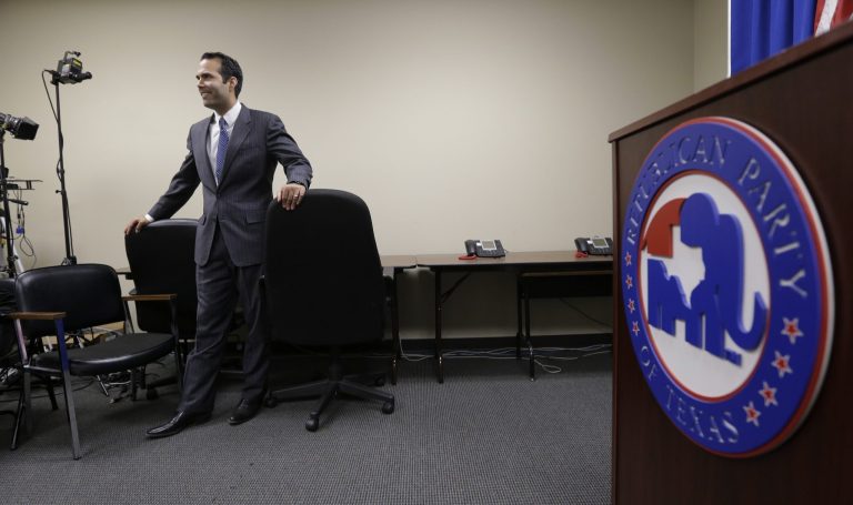In this Nov. 19, 2013 file photo, George P. Bush, the grandson of one former president and nephew of another, signs papers at the Republican Party of Texas headquarters in Austin, Texas, where he formally filed to run for Texas land commissioner. In a sharp pivot from a decade of Republican swagger in Texas, a bravado that comes with controlling every statewide office, conservatives are muffling mocking tones about Democrats and now openly calling them formidable. (AP File)