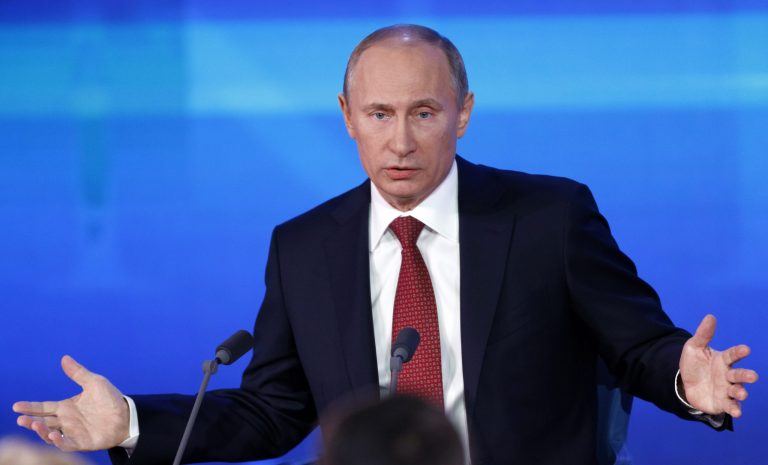 Russian President Vladimir Putin speaks during a news conference in Moscow, Russia, Thursday, Dec. 20, 2012. Putin says a draft bill banning U.S. adoptions of Russian children is a legitimate response to a new U.S. law that calls for sanctions on Russians deemed to be human rights violators. But he has not committed to signing it. 