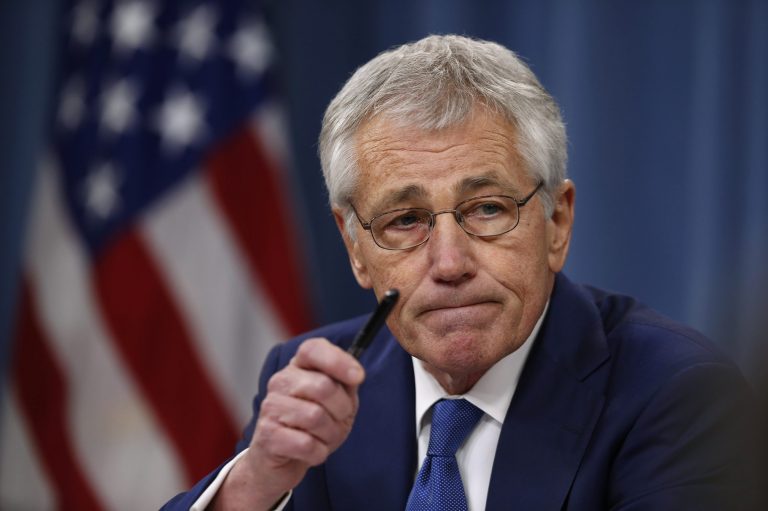 In this Dec. 19 photo, Defense Secretary Chuck Hagel takes questions as he briefs reporters at the Pentagon in Washington. Veterans groups are fighting part of the new budget deal signed into law Dec. 20 that curbs annual pension increases for military retirees under age 62. After a barrage of protests from the military community, lawmakers said they'll review the cut next year and possibly reverse it.(AP Photo/Charles Dharapak)