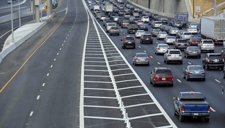 The new Capital Beltway express lanes (left) a few days before they opened on Interstate 495. (AP photo)