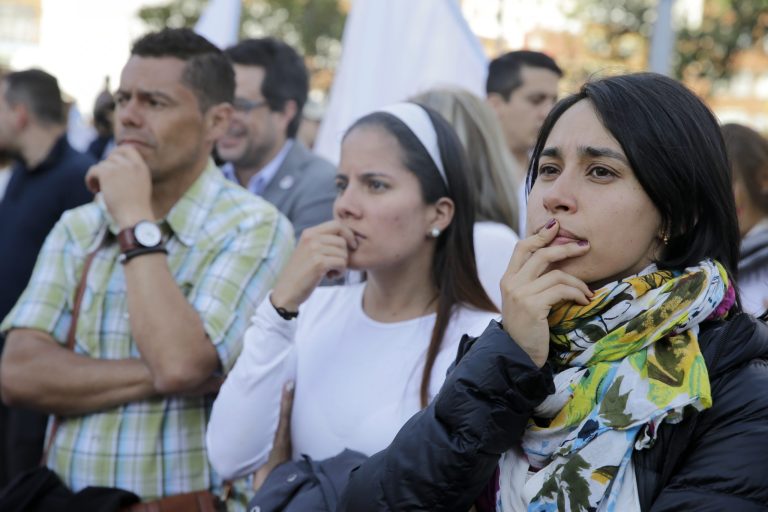 Colombians witness the returns coming in. (AP Photo/Ricardo Mazalan)