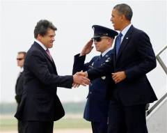 Handshake, no hug for Obama as Rick Perry greets president in Texas