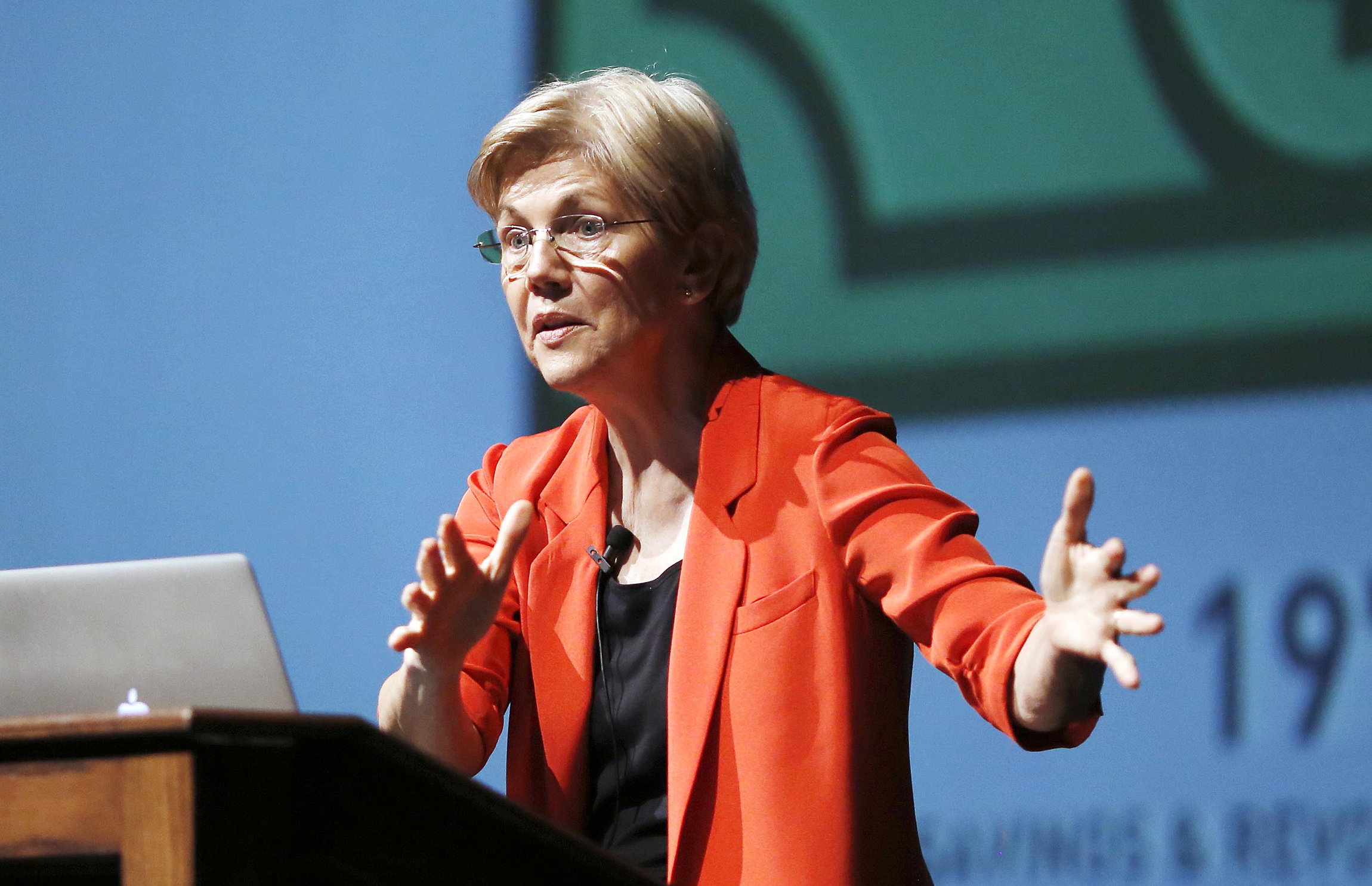 Warren ties Toomey to Trump in Philly campaign stop