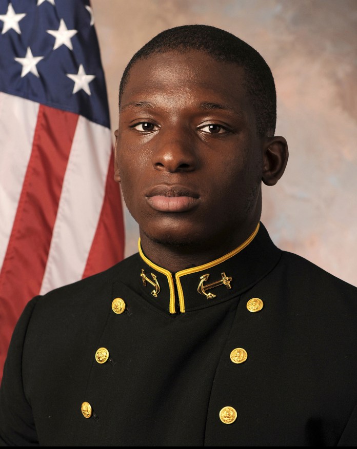 FILE - This July, 24, 2013 file photo provided by the U.S. Naval Academy shows Midshipman Joshua Tate, a former U.S. Naval Academy football player accused of sexual assault. Lawyers are expected to give opening statements Tuesday in the court-martial of Joshua Tate of Nashville, Tenn. Opening statements had been scheduled for Monday but were delayed because of snow.   (AP Photo/U.S. Naval Academy, File)
