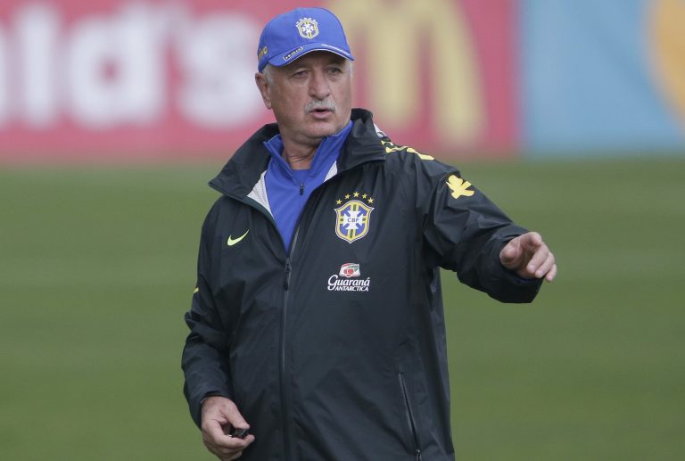 Brazil's coach Luiz Felipe Scolari directs his players during a training session of the Brazilian national socccer team at the Granja Comary training center in Teresopolis, Brazil, Monday, June 9, 2014. Brazil plays in group A of the 2014 soccer World Cup. (AP Photo/Andre Penner)