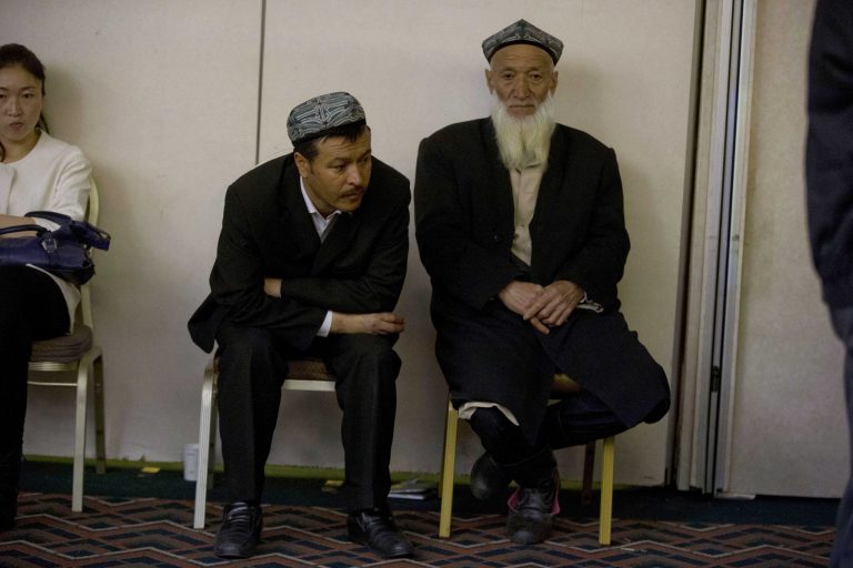 Relatives of Chinese passengers aboard the missing Malaysia Airlines, flight MH370, wait for news at a hotel room in Beijing, China, Saturday, March 22, 2014. A satellite spotted two large objects in the desolate southern Indian Ocean earlier this week, raising hopes of finding the Boeing 777 that disappeared March 8 with 239 people on board, although nothing was spotted in a sea search over the last two days. (AP Photo/Ng Han Guan)