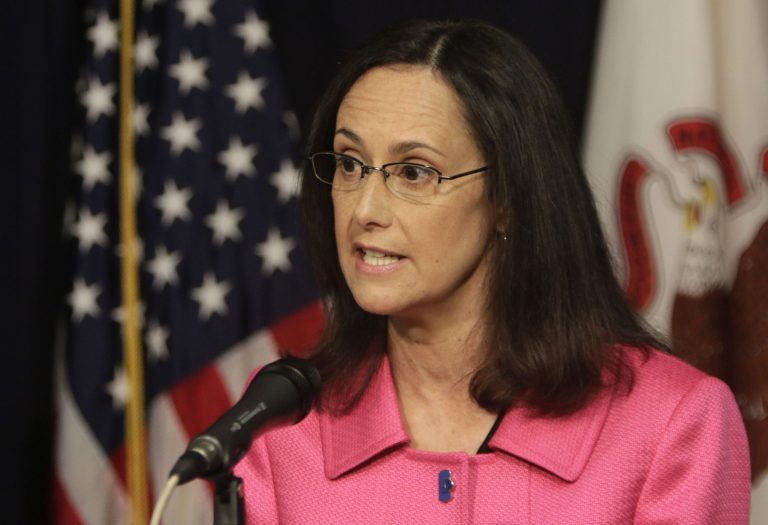 Illinois Attorney General Lisa Madigan speaks during a press conference Monday, July 14, 2014, in Chicago. Madigan has filed lawsuits against two companies for allegedly scamming people who are repaying student loan debt. The lawsuits name Chicago-based First American Tax Defense LLC and Frisco, Texas-based Broadsword Student Advantage LLC. The companies allegedly charged people up to $1,200 up front for sham services.(AP Photo/Stacy Thacker)