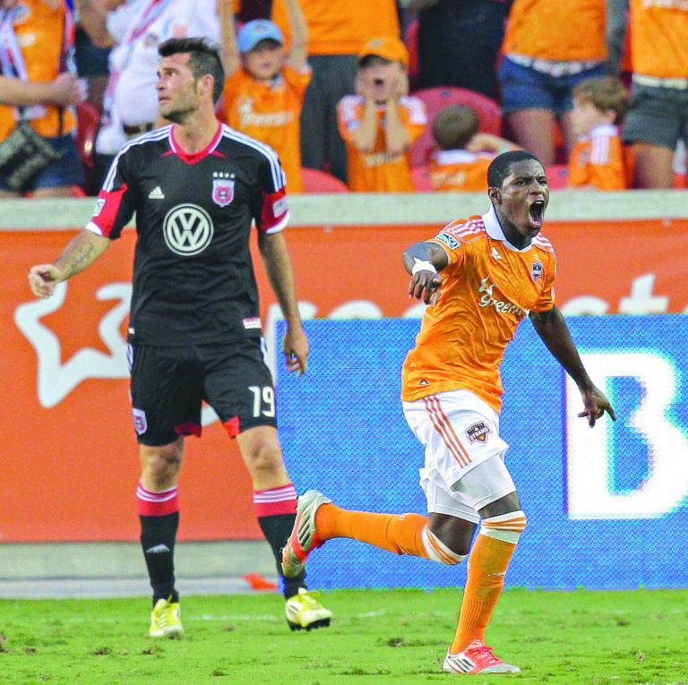 Bob Levey/Getty Images
Kofi Sarkodie scored one of the Dynamo's three second-half goals Sunday against Emiliano Dudar and D.C. United.