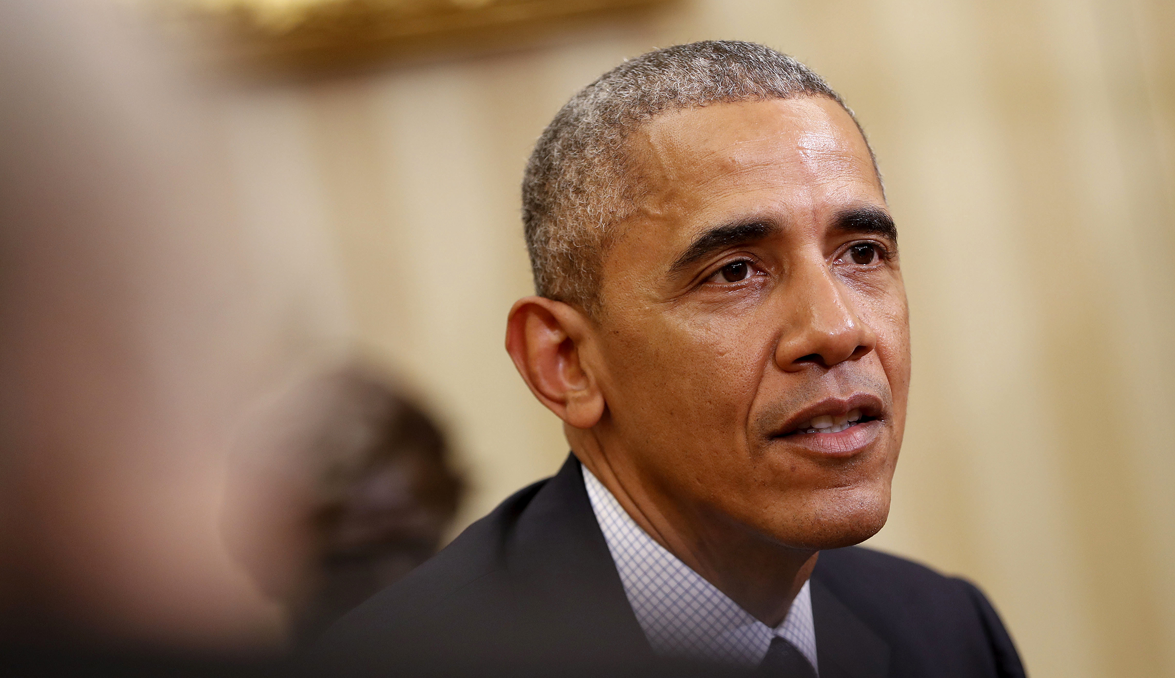 What Obama used the red button in the Oval Office for