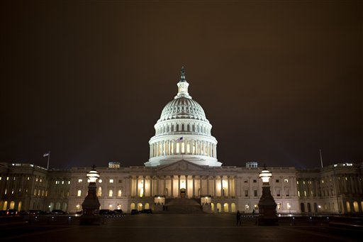 The lights of the U.S. Capitol remain lit into the night as the House voted on the 
