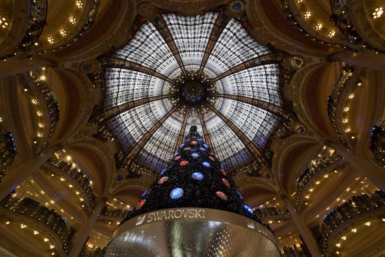   A Christmas tree is seen in the main hall of the Galeries Lafayette department store in Paris, Tuesday, Dec. 18, 2012. (AP Photo/Michel Euler)  