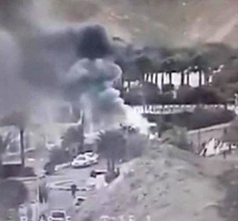 An image made from a video provided by the Israeli Airports Authority shows smoke  from the bombing of the bus carrying South Korean sightseers near the tip of the Red Sea's Gulf of Aqaba Sunday Feb. 16, 2014.  At least three South Korean tourists were killed and 12 seriously wounded, according to Egyptian security officials.   (AP Photo/Israeli Airports Authority)