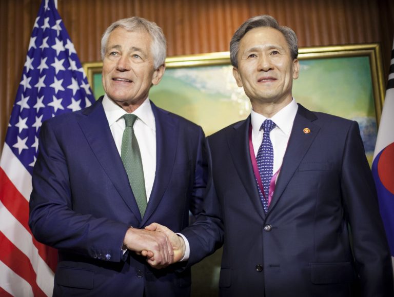 U.S. Defense Secretary Chuck Hagel, left, meets with South Korean Defense Minister Kim Kwan-jin, right, Saturday, May 31, 2014 in Singapore. Hagel traveled to Singapore to attend the 13th Asia Security Summit. (AP Photo/Pablo Martinez Monsivais, Pool)
