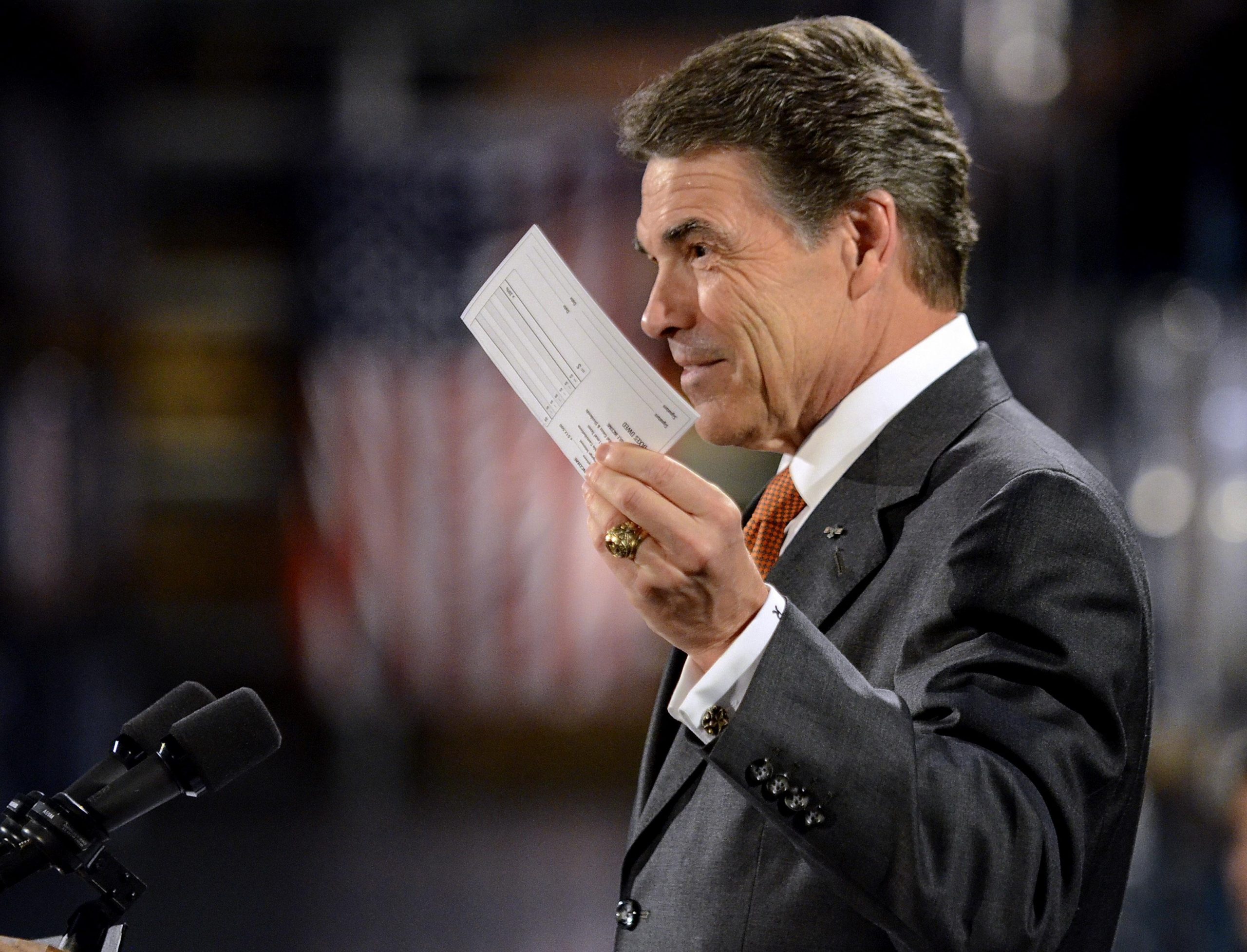 Perry rolls out flat tax plan