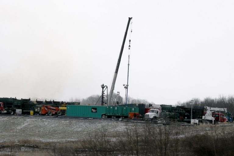A Feb. 16 photo shows a crane near the well where the hydraulic fracturing process is used to release natural gas from shale deposits, at a gas well site in Zelienople, Pa. (AP Photo/Keith Srakocic)