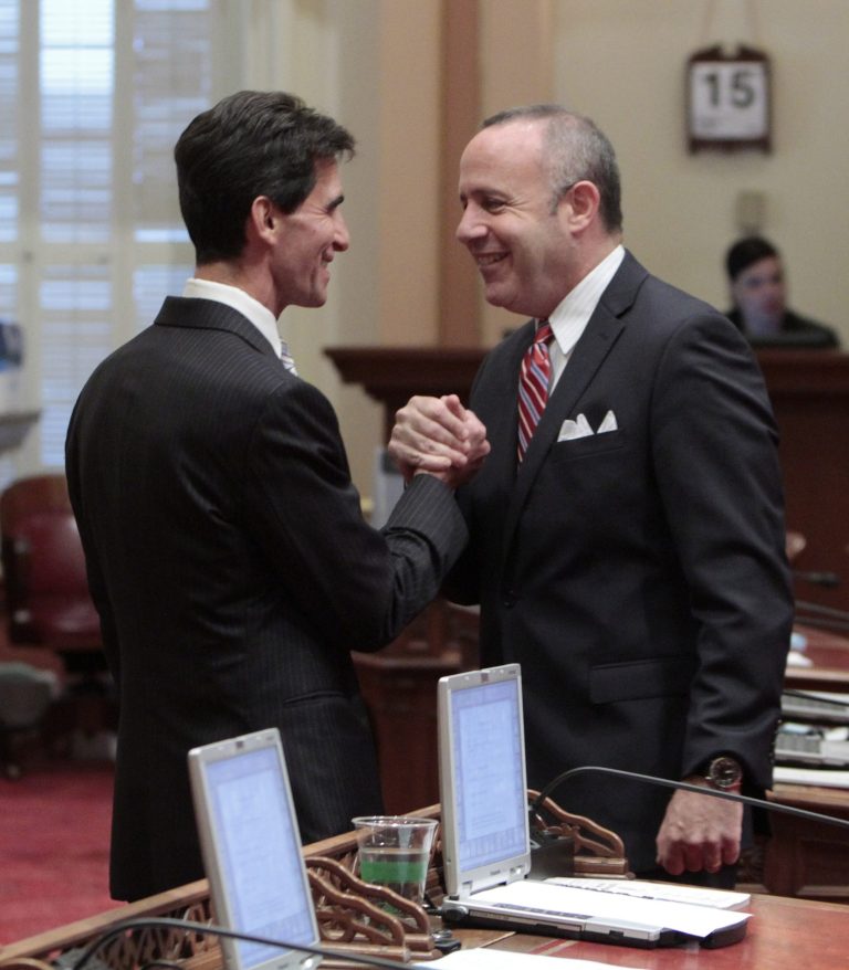  CORRECTS DATE TO FRIDAY, JUNE 15, 2012- State Senate President Pro Tem Darrell Steinberg, D-Sacramento, right, shakes hands with Senate Budge Committee Chairman Mark Leno, D-San Francisco, before the Senate took up the state budget at the Capitol in Sacramento, Calif., Friday, June, 15, 2012. The Senate approved the budget plan by a 23-16 vote and sent it to the Assembly.(AP Photo/Rich Pedroncelli)  