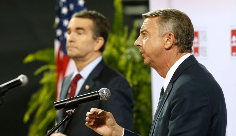 The two candidates are within the poll's margin of error. (AP Photo/Steve Helber)