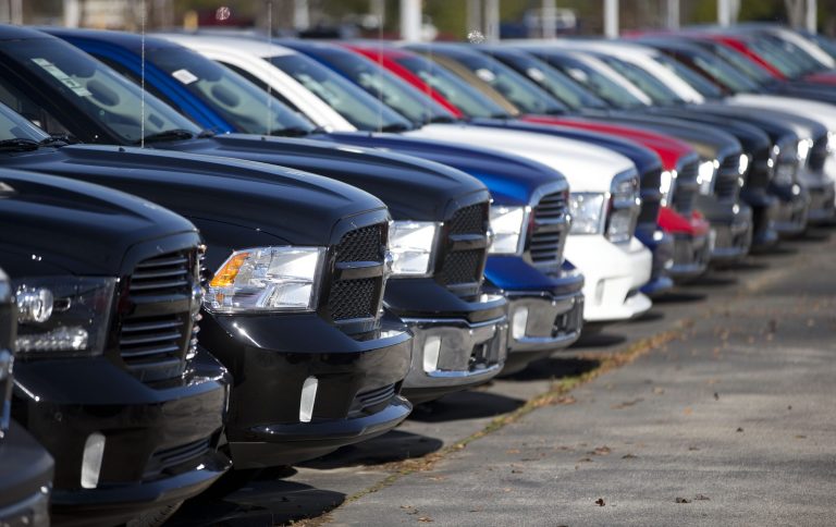 The report released by House Republicans details how the CFPB went after auto dealers and auto loan companies who provide financing to car buyers. (AP Photo/John Bazemore, File)