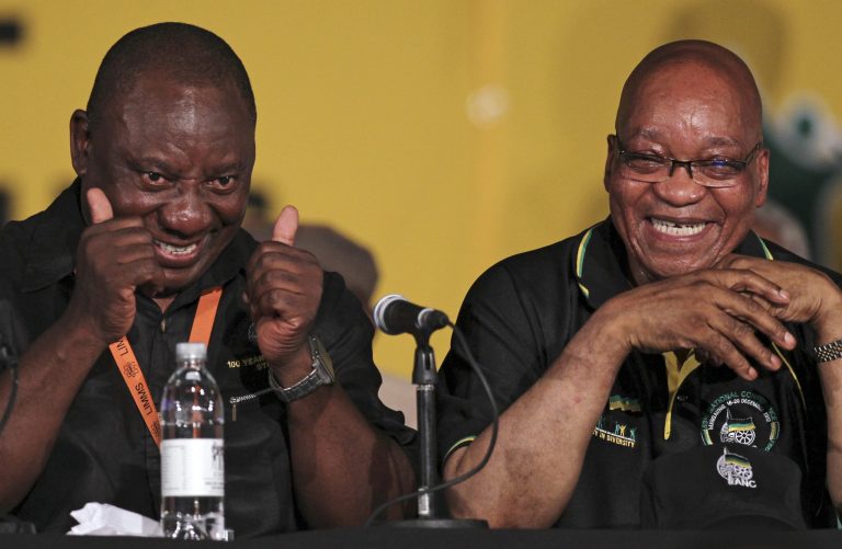   African National Congress (ANC) re-elected President Jacob Zuma, right, with his new deputy Cyril Ramaphosa, left, during their elective conference at the University of the Free State in Bloemfontein, South Africa, on Tuesday, Dec. 18, 2012. (AP Photo/Themba Hadebe)  