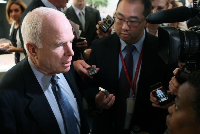 U.S. Sen. John McCain, R-Ariz., is questioned by reporters after he left a closed door joint Senate and House Intelligence Committee meeting on Capitol Hill, on June 7, 2012. (Photo by Mark Wilson/Getty Images)