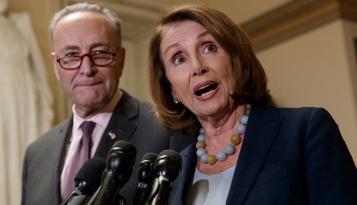 "Democrats are prepared to offer our votes for the Harvey aid package, and a short term debt limit increase of three months," House Minority Leader Nancy Pelosi, D-Calif., and Senate Minority Leader Chuck Schumer, D-N.Y., said in a statement. (AP Photo/J. Scott Applewhite, File)