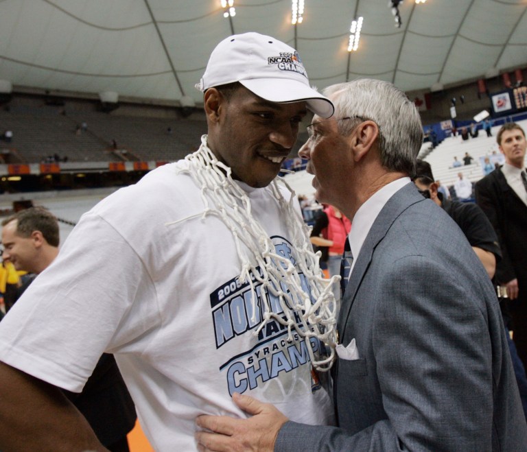 North Carolina coach Roy Williams chatting with Rashad McCants after a 2005 basketball victory. (AP/David Duprey, File)