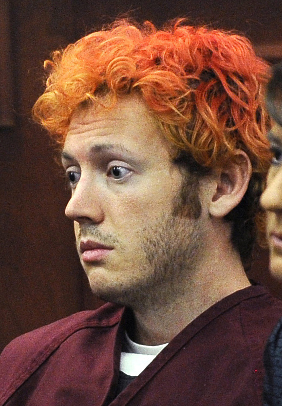   FILE - In this July 23, 2012 file photo, James Holmes, accused of killing 12 people in a shooting rampage in an Aurora, Colo., movie theater, appears in Arapahoe County District Court in Centennial, Colo. The University of Colorado at Denver has released thousands of documents that may relate to the man accused in the Colorado theater shootings. More than 2,000 records were released Wednesday Dec. 5, 2012, after news organizations, including The Associated Press, requested them to learn about James Holmes' year at the school. (AP Photo/Denver Post, RJ Sangosti, Pool, File)  