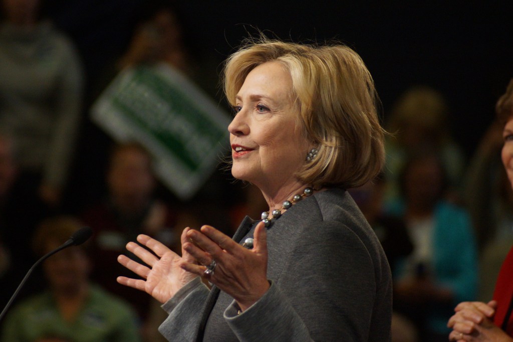 Clinton’s Campaign Chair Tells Brock to Chill