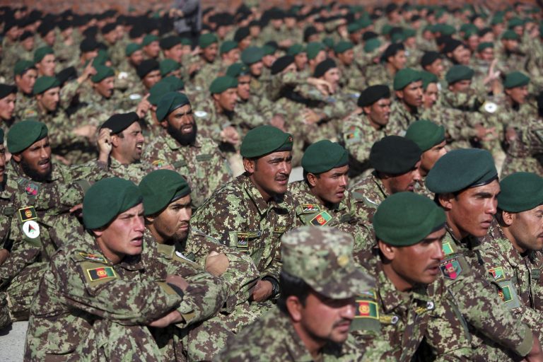 New members of the Afghan National Army attend their graduation ceremony at the Afghan Military Academy in Kabul, Afghanistan, Sunday, Nov. 23, 2014. (AP Photo/Rahmat Gul)
