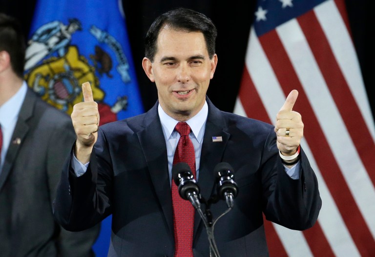 Wisconsin Republican Gov. Scott Walker gives a thumbs up as he speaks at his victory party on Nov. 4. (AP/Morry Gash)