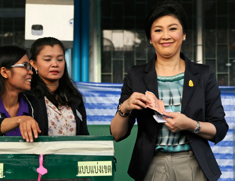 Pheu Thai party leader Yingluck Shinawatra casts her vote in a general election at a polling station in Bangkok, Thailand, Sunday, Feb. 2, 2014.(AP Photo/Wally Santana)