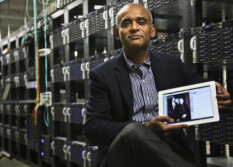 Chet Kanojia, founder and CEO of Aereo, Inc., shows a tablet displaying his company's technology, in New York. (AP/Bebeto Matthews)