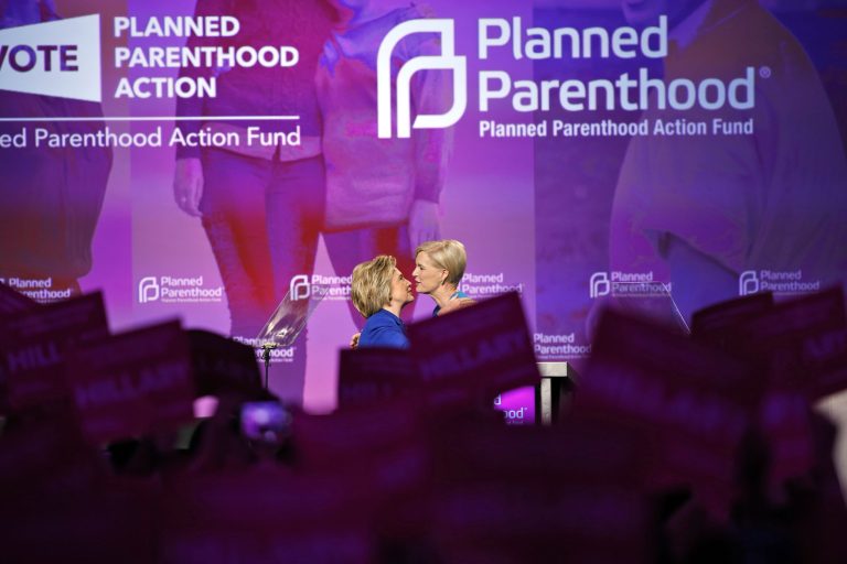 Democratic presidential candidate Hillary Clinton, left, is greeted by Cecile Richards, left, the president of Planned Parenthood, as she arrives to speak at a Planned Parenthood Action Fund membership event, Friday, June 10, 2016 in Washington. (AP Photo/Alex Brandon)