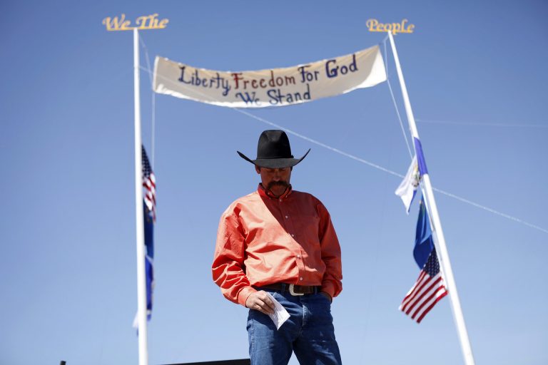 Rancher Derrel Spencer speaks during a rally in support of Cliven Bundy near Bunkerville Nev. Monday, April 7, 2014, 2014. The Bureau of Land Management has begun to round up what they call 