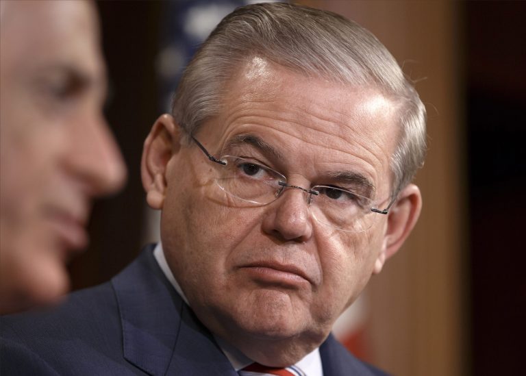This March 27, 2014 file photo shows Sen. Bob Menendez, D-N.J., on Capitol Hill in Washington. Menendez says his attorney has asked the Justice Department to investigate whether the Cuban government had a role in allegations against him that have prompted a federal probe of the New Jersey Democrat.