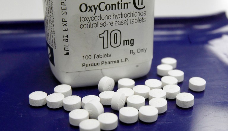 A new report suggests that because people who were uninsured were able to get government-funded Medicaid coverage under Obamacare, they are now receiving more access to prescription painkillers like OxyContin. (AP Photo/Toby Talbot, File)