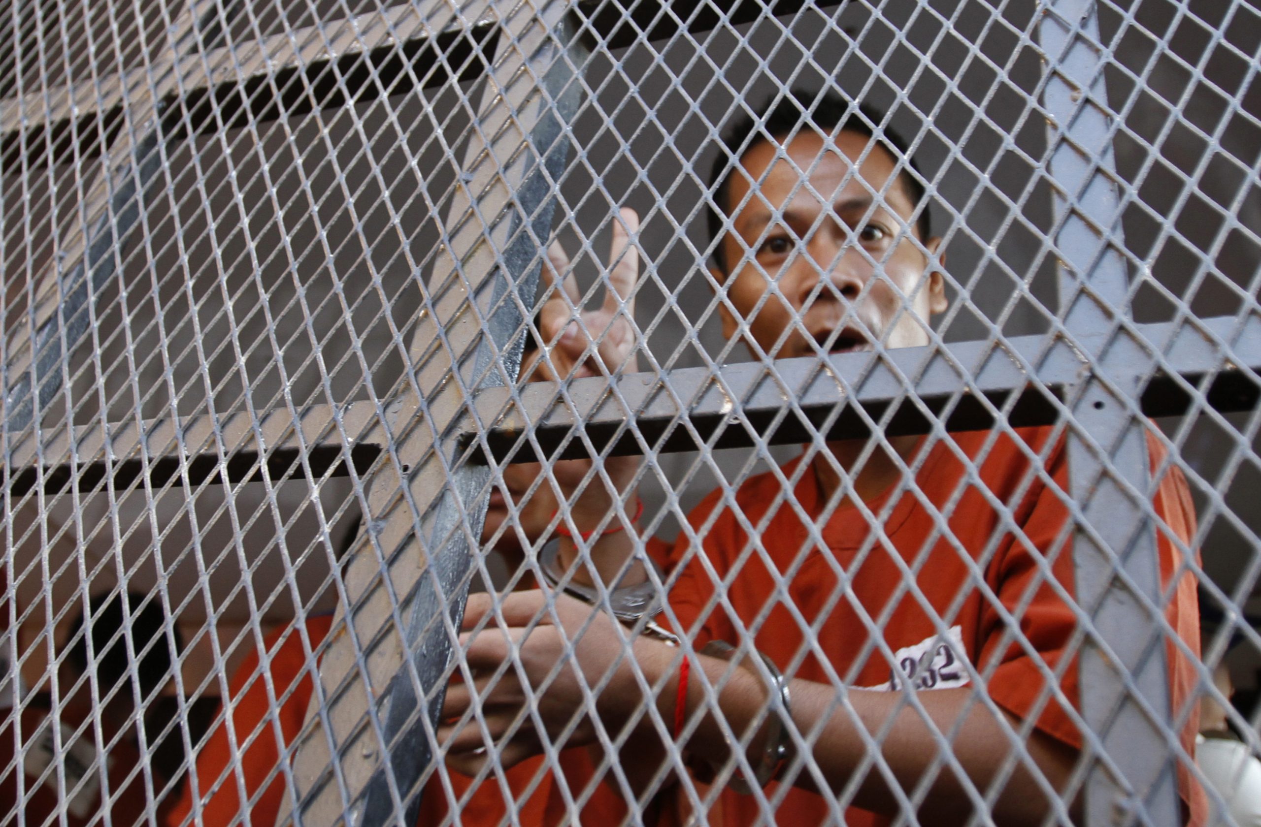 Cambodia convicts labor activists, then frees them