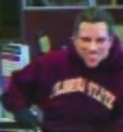 Authorities seek robber who wore Mitt Romney mask