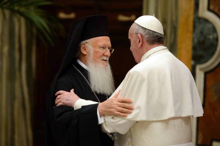FILE- In this March 20, 2013, file photo provided by the Vatican paper L' Osservatore Romano, Pope Francis, right, meets Bartholomew I, the first ecumenical patriarch to attend the installation of a Pope since the Catholic and Orthodox church split nearly 1,000 years ago, at the Vatican. Bartholomew I, spiritual leader of 250 million Orthodox Christians, said a meeting with Pope Francis in Jerusalem in May 2014, will help move the two churches closer to ending their nearly one-thousand-year divide. (AP Photo/Osservatore Romano, File)