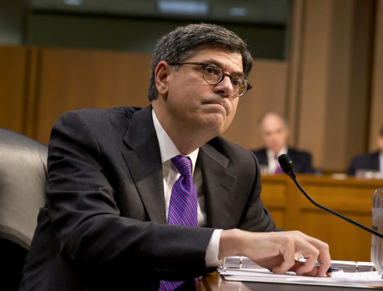 FILE - In this Oct. 10, 2013 file photo Treasury Secretary Jacob Lew testifies before the Senate Finance Committee on Capitol Hill in Washington to urge Congress to reopen the government and lift the US borrowing cap. Lew said Sunday, Oct. 20, 2013, that the fight over government spending pushed the country near the brink of default and the lesson has to be that it can't happen again. Lew says this latest battle was scarier than the 2011 budget fight because it got 