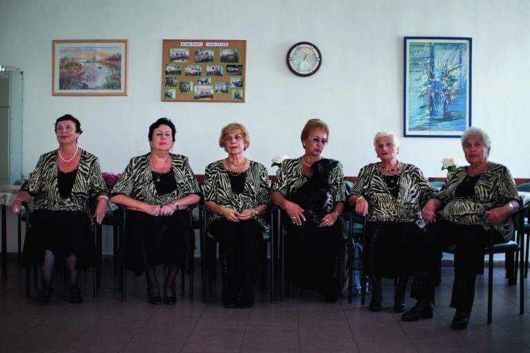 In this Nov. 4, 2012 photo, a choir practices in a government-funded elderly care facility catering to Russian-speaking immigrants in Ashdod, southern Israel. The choir sings Russian standards and Israeli folk songs translated into Russian. (AP Photo/Oded Balilty)