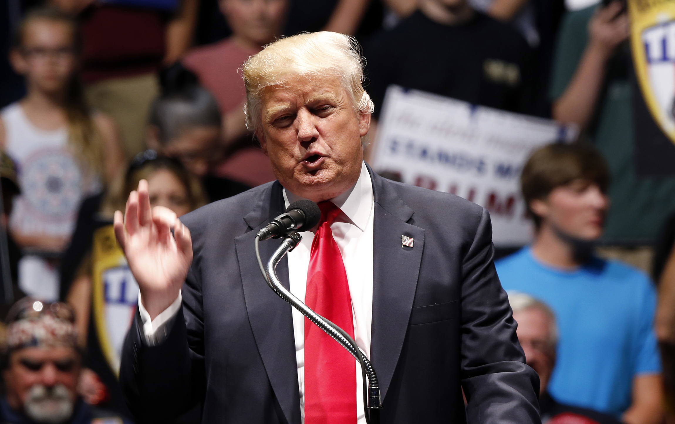 Trump begins pivot to November, bashes Clinton, Warren