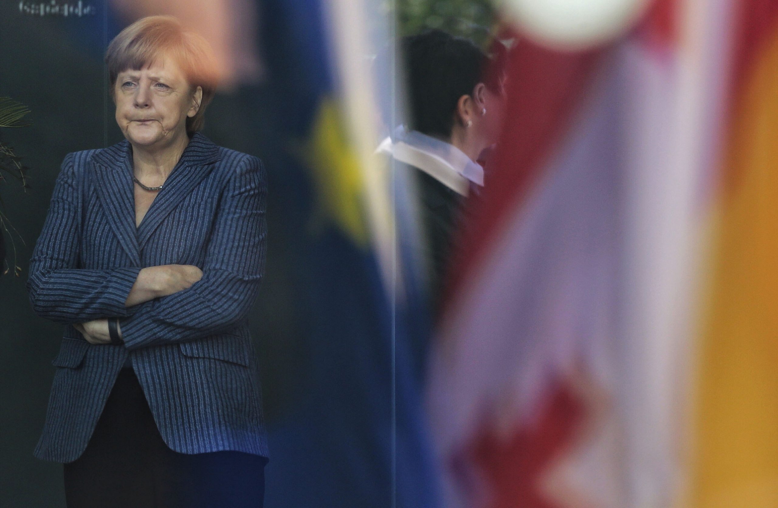 Merkel seeks unity as Europe argues over EU job