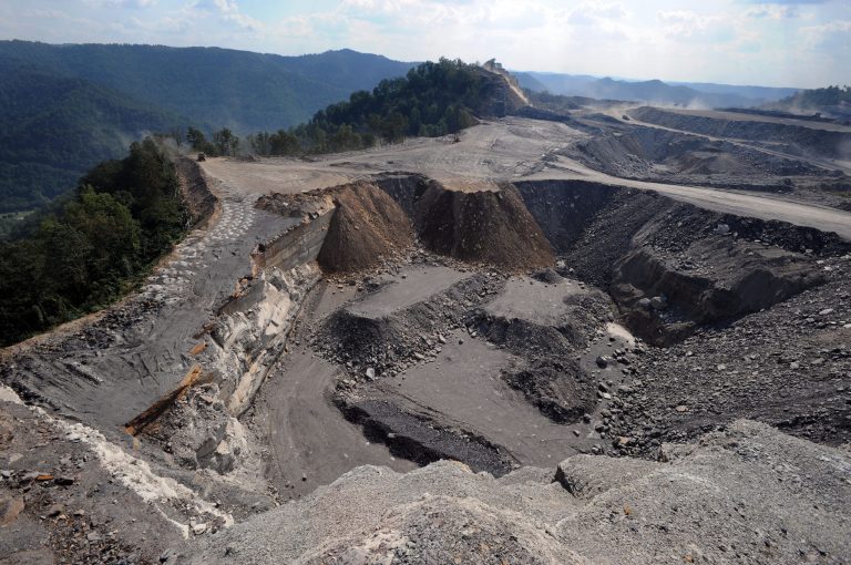 FILE - This Sept. 18, 2008 file photo shows a mountaintop removal mining site at Kayford Mountain, W.Va. The House is taking up a bill to prevent the Obama administration from imposing a stream-protection rule for coal mining that government experts say would  eliminate thousands of jobs. The rules are supposed to replace Bush-era regulations that set up buffer zones around streams and were aimed chiefly at mountaintop removal mining in Appalachia. Republicans say they are part of Obama's 