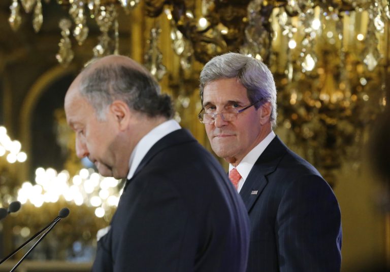   U.S. Secretary of State John Kerry, right, and France's Foreign Minister Laurent Fabius at the Quai d' Orsay, in Paris during their meeting Saturday , Sept. 7, 2013. Kerry traveled to Europe to court international support for a possible strike on the Syrian regime for its alleged use of chemical weapons while making calls back home to lobby Congress where the action faces an uphill battle. (AP Photo/Jacques Brinon)  