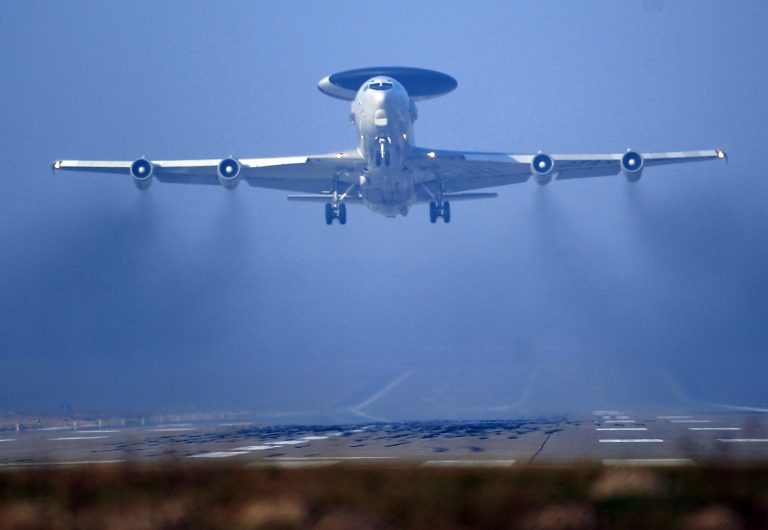 A Nato AWACS plane takes off the NATO Airbase in Geilenkirchen, Germany, Wednesday, March 12, 2014. AWACS planes flying out of Geilenkirchen to patrol over Romania and Poland. (AP Photo/Frank Augstein)